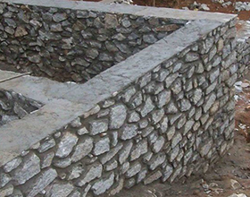 Строительство дома из бутового камня — плюсы и недостатки